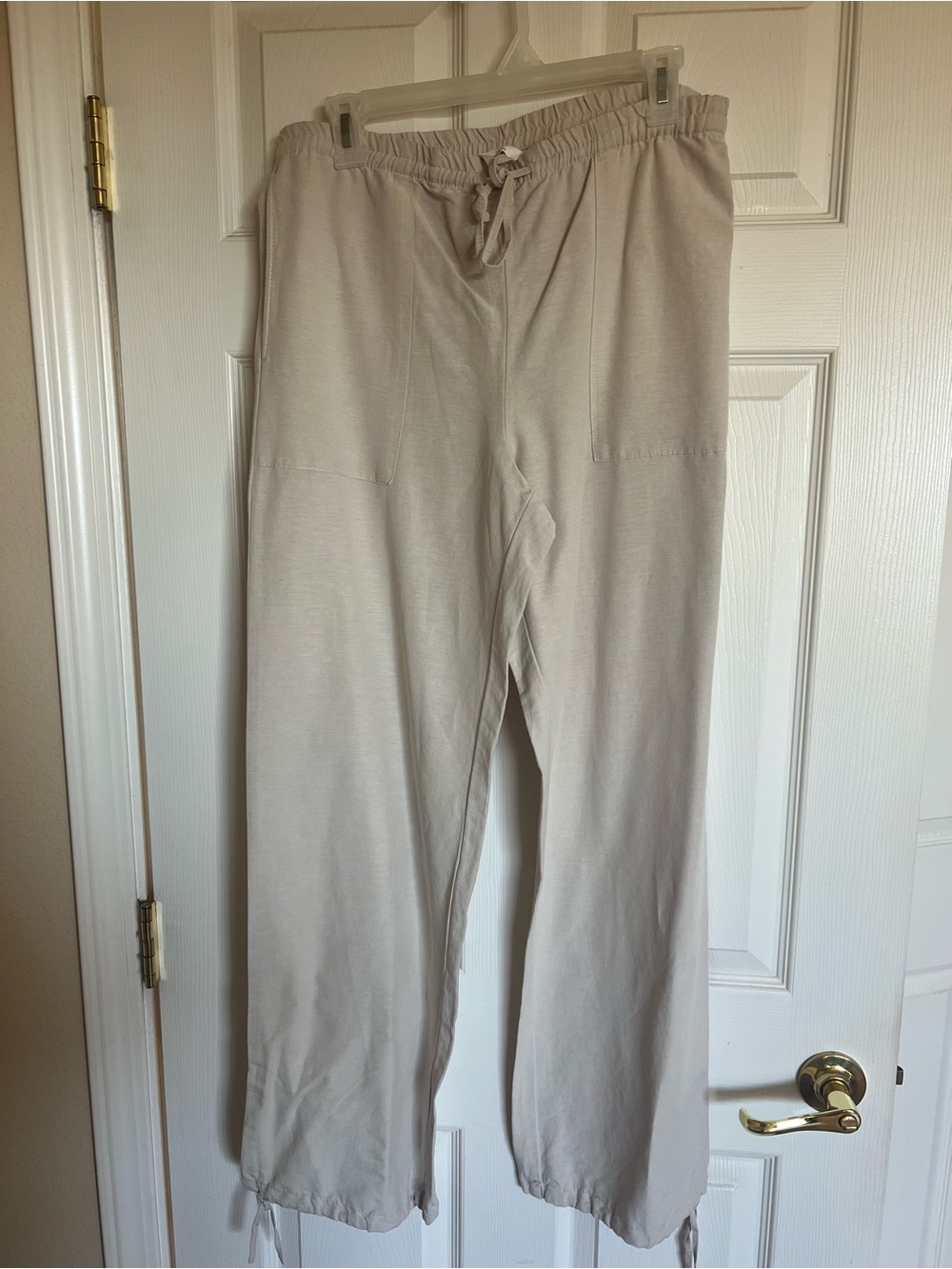 Ladies Casual Drawstring Linen Pants with drawstring hem.